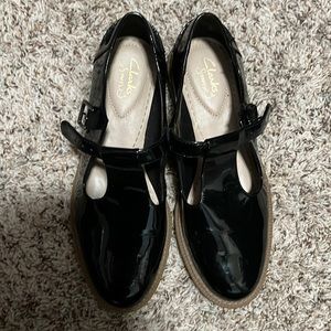 Patent leather Clark’s Mary Jane style shoes